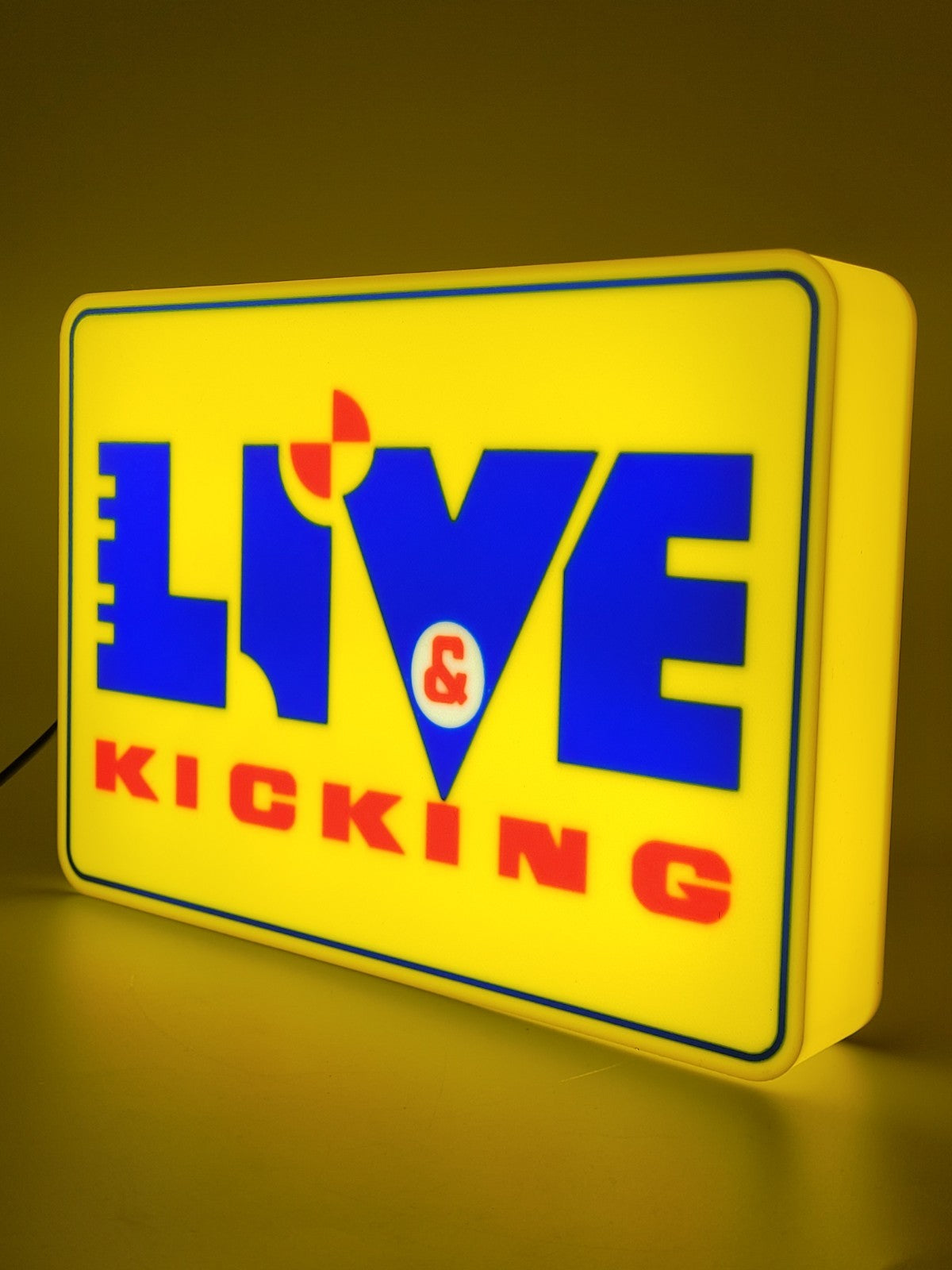 Live And Kicking Light Box Sign